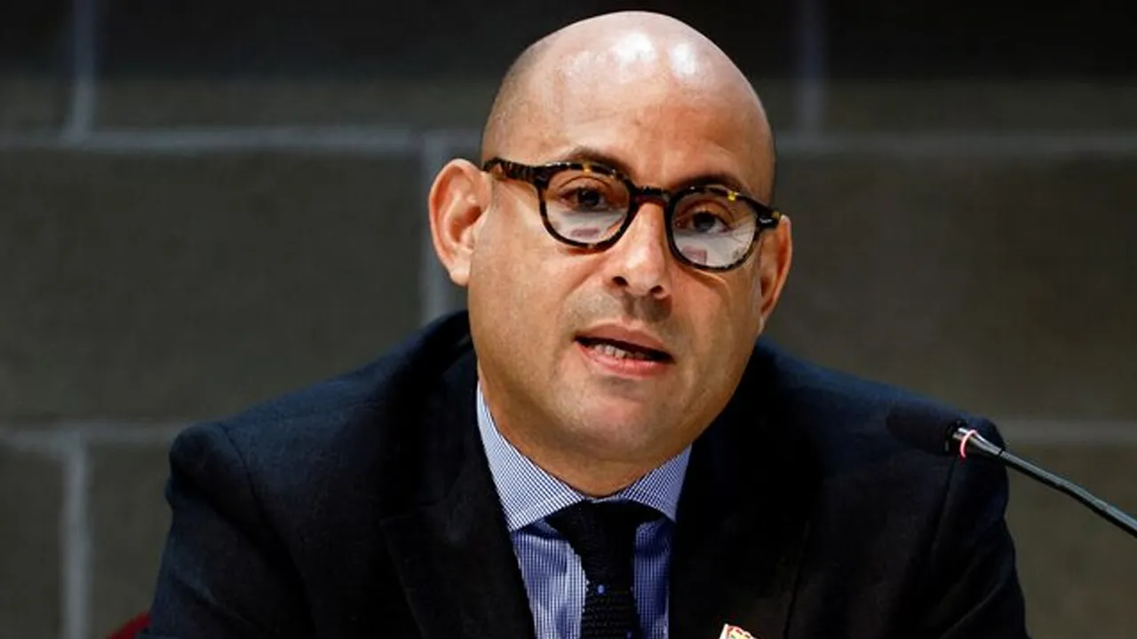 Simon Stiell speaks at a news conference during the pre-COP26 climate meeting in Milan, Italy October 2, 2021. REUTERS/Guglielmo Mangiapane