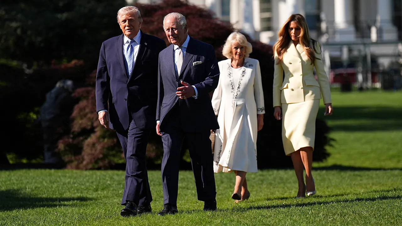 Britain's King Charles and Queen Camilla walk as they join US President Donald Trump and US First Lady Melania for a tour of the White House beehives in the grounds of the White House, on day one of the state visit to the US, in Washington D.C., U.S., April 27, 2026. Aaron Chown/Pool via REUTERS