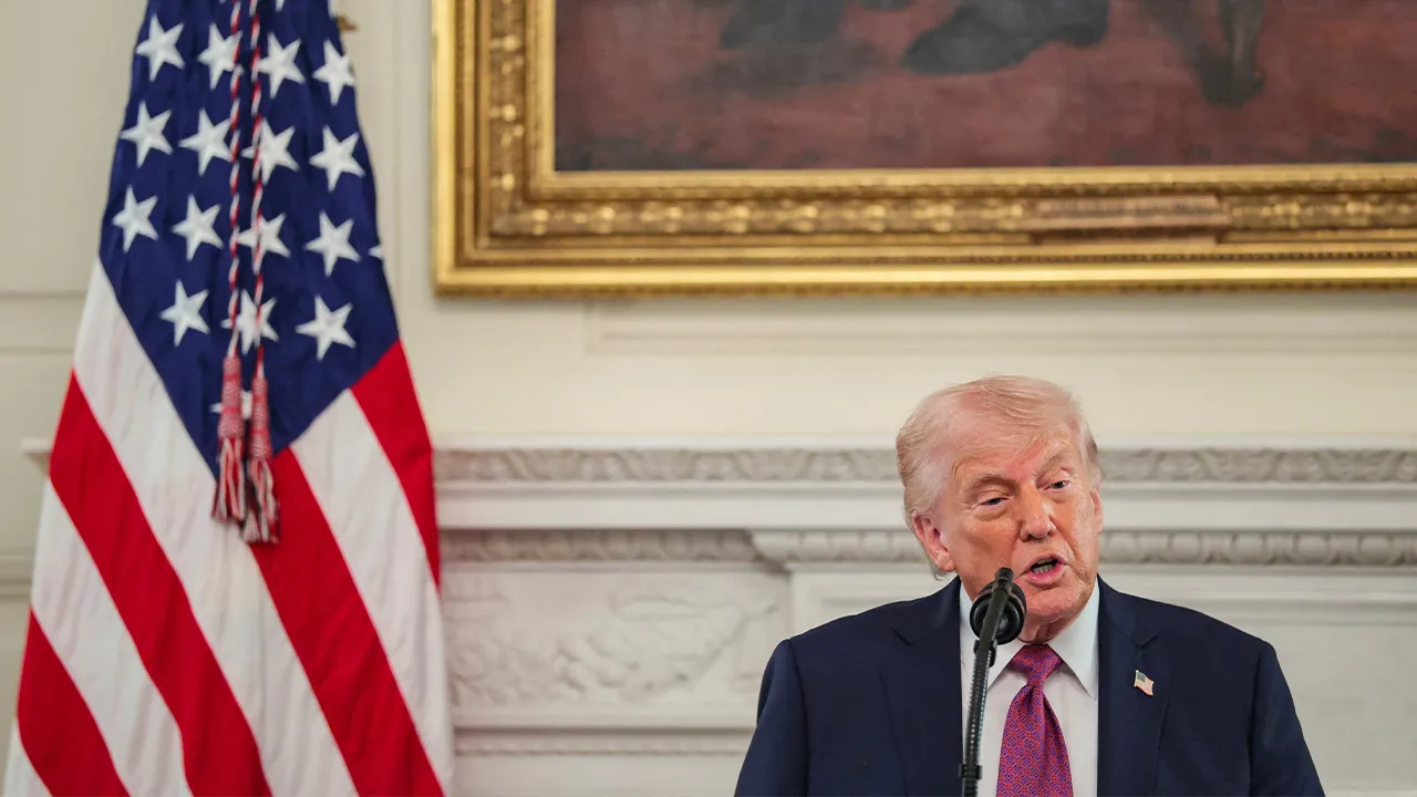 U.S. President Donald Trump delivers remarks to NCAA Collegiate National Champions in the State Dining Room at the White House in Washington, D.C., U.S., April 21, 2026. REUTERS/Kylie Cooper