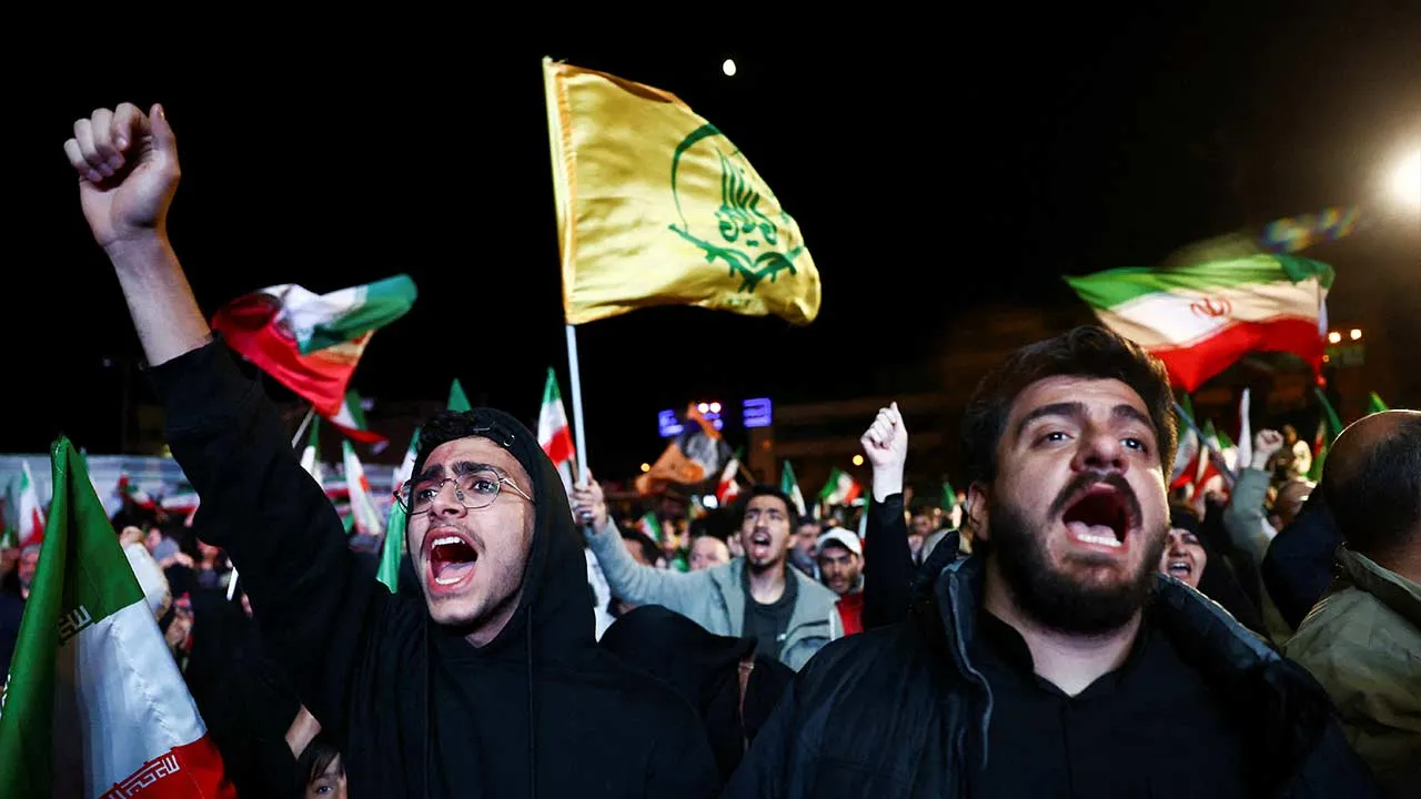People shout slogans as they gather after a two-week ceasefire in the Iran war was announced, in Tehran, Iran, April 8, 2026. Majid Asgaripour/WANA (West Asia News Agency) via REUTERS ATTENTION EDITORS - THIS PICTURE WAS PROVIDED BY A THIRD PARTY. REFILE - QUALITY REPEAT TPX IMAGES OF THE DAY