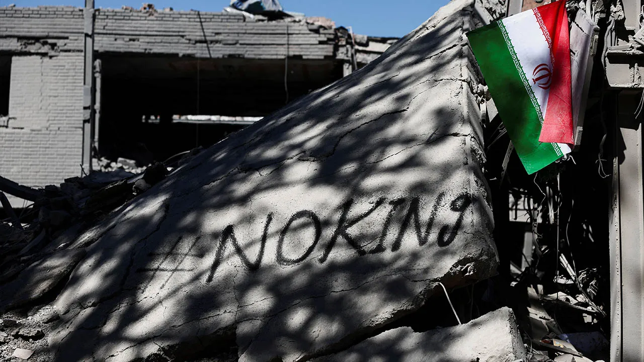 An Iranian flag hangs amidst the rubble of a building of the Sharif University of Technology, which was damaged in a strike, amid the U.S.-Israeli conflict with Iran, in Tehran, Iran, April 7, 2026. Majid Asgaripour/WANA (West Asia News Agency) via REUTERS