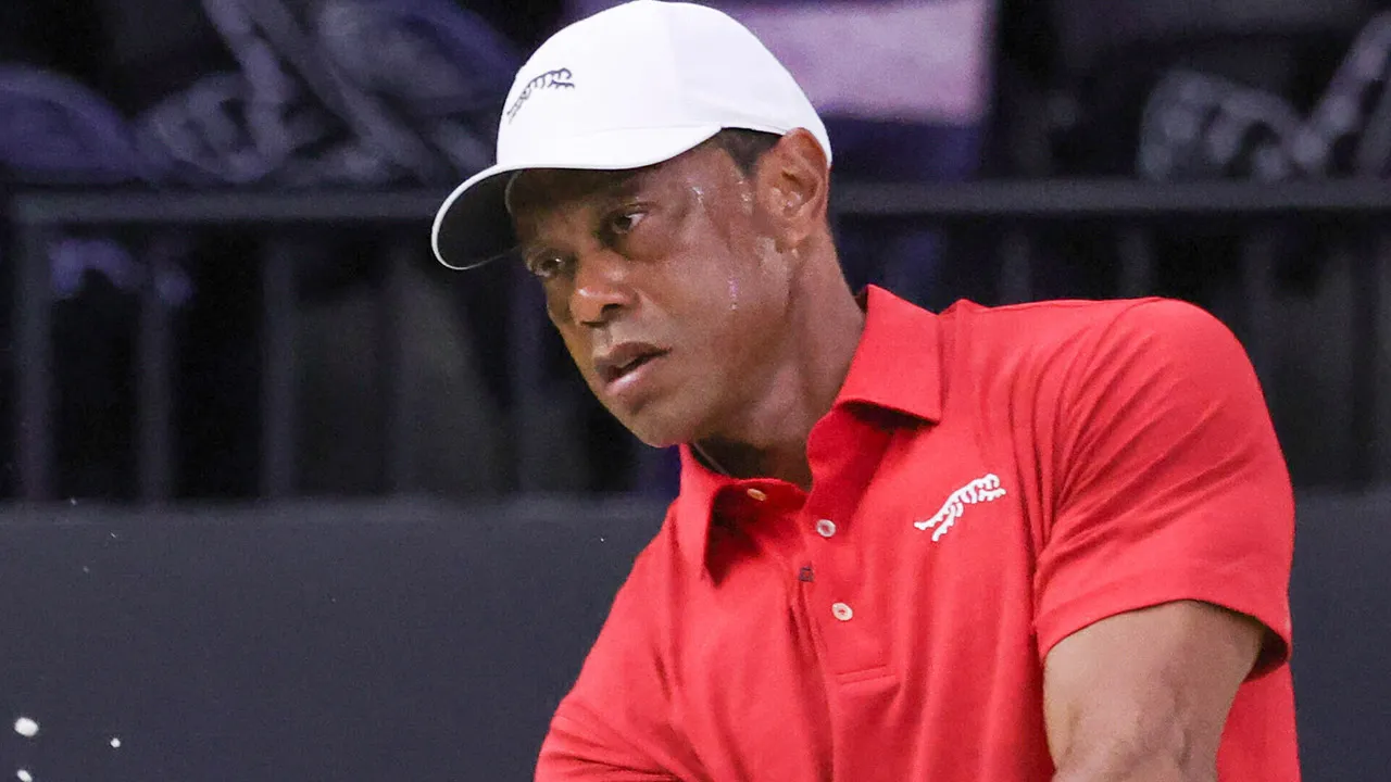 Tiger Woods hits a practice shot from a bunker before the TGL finals golf tournament in Palm Beach Gardens, Fla., Tuesday, March 24, 2026. (AP Photo/Reinhold Matay)