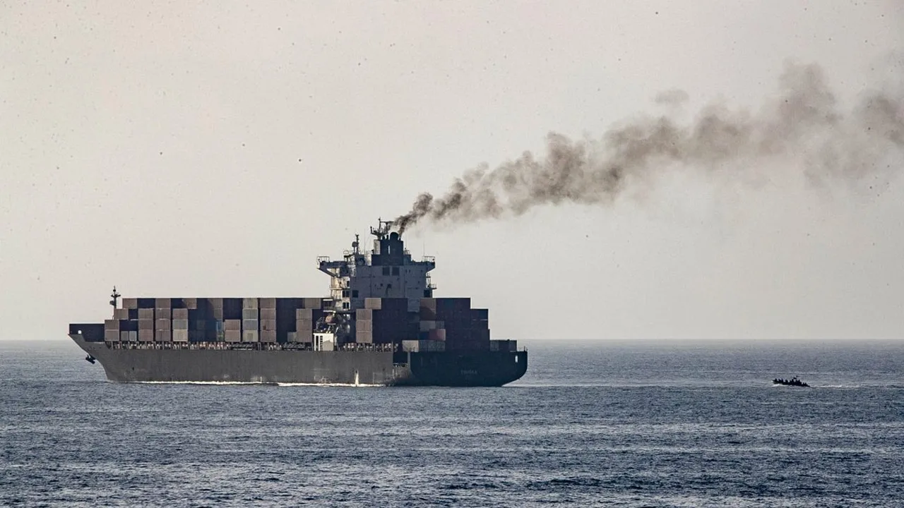 U.S. forces patrol the Arabian Sea near M/V Touska, April 20, as the Iranian-flagged vessel's container cargo is searched after U.S. Marines boarded and seized the ship when it attempted to violate the U.S. naval blockade.
