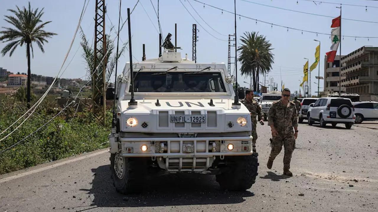United Nations Interim Force in Lebanon (UNIFIL) peacekeepers and members of the Lebanese army arrive at the site, after an Israeli strike severed the last remaining bridge linking southern Lebanon to the rest of the country, in Qasmiyeh, Lebanon April 16, 2026. REUTERS/Louisa Gouliamaki 