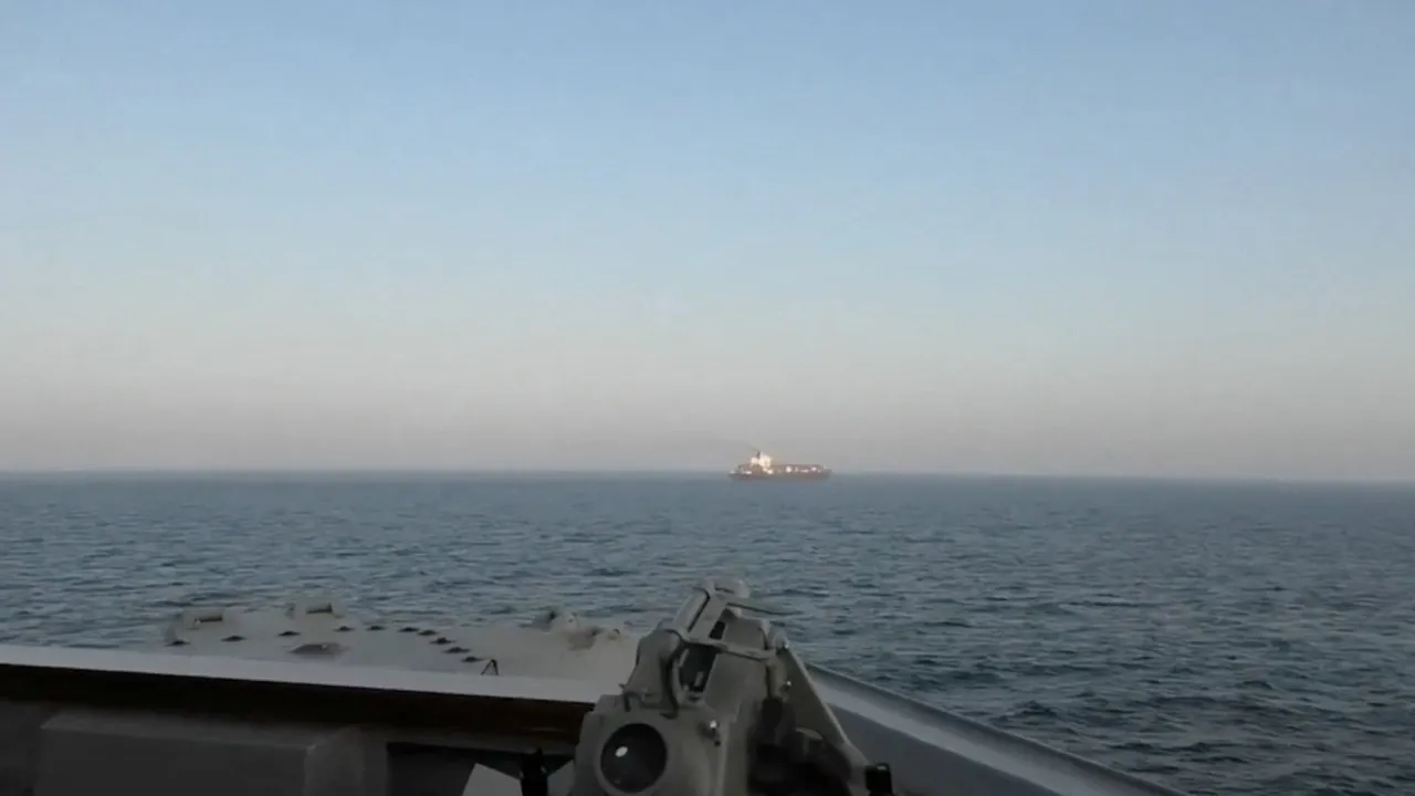 A view of Iranian-flagged cargo ship Touska as USS Spruance (DDG 111) conducts its interception in a location given as the north Arabian Sea, in this screen capture from a video released April 19, 2026. — Centcom/Handout via Reuters