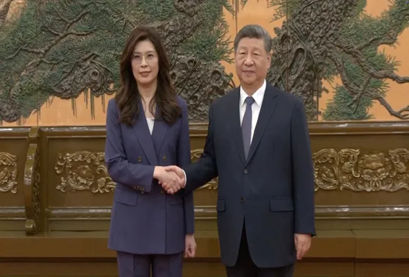Cheng Li-wun, chairperson of the Kuomintang (KMT), Taiwan's largest opposition party, shakes hands with Chinese President Xi Jinping at the Great Hall of the People in Beijing, China April 10, 2026, in this screengrab from a video provided by CTI. CTI via REUTERS