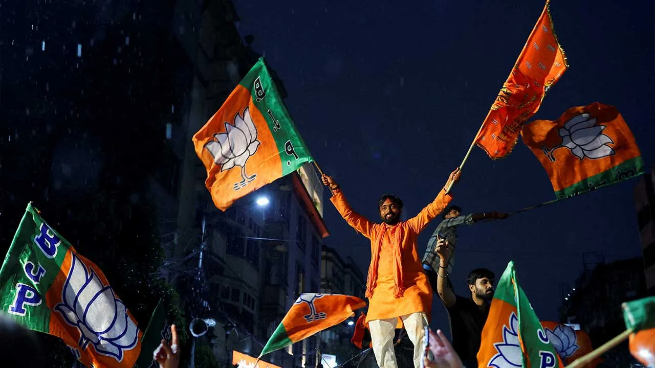 India's ruling Bharatiya Janata Party (BJP) supporters celebrate their party leading in the West Bengal state assembly elections, outside the party's regional office in Kolkata, India, May 4, 2026. REUTERS/Sahiba Chawdhary REFILE - CORRECTING FROM "CELEBRATE THEIR PARTY'S WIN" TO "CELEBRATE THEIR PARTY LEADING".
