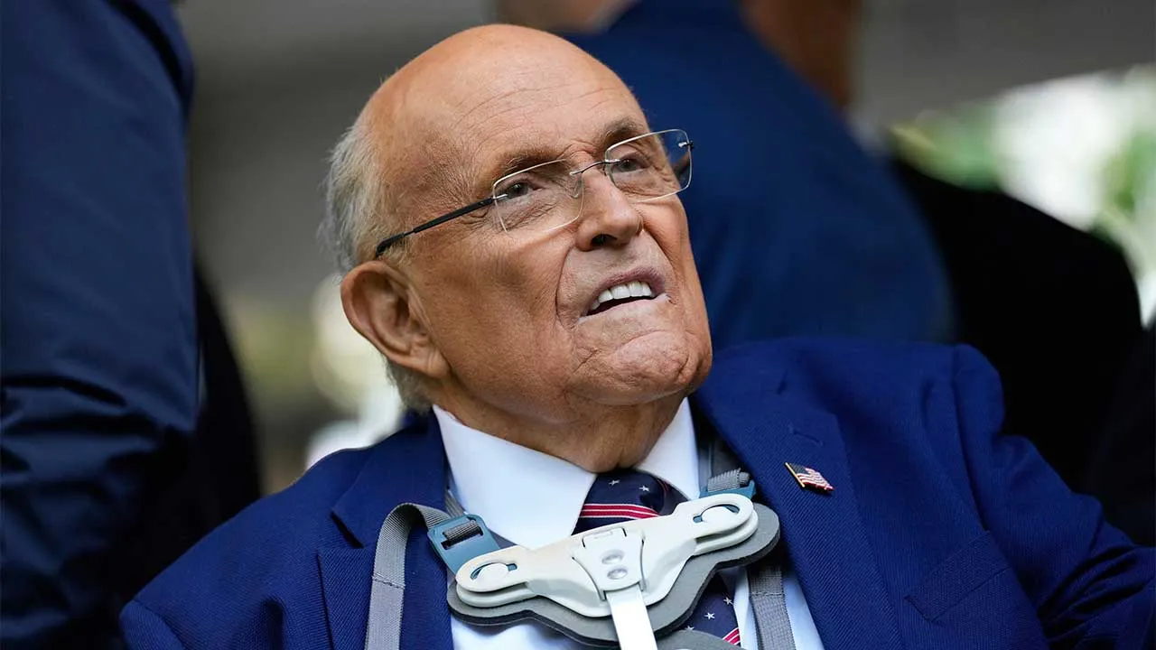 FILE - Former NYC mayor Rudy Giuliani participates in a ceremony commemorating the anniversary of the 9-11 terror attacks in New York, Thursday, Sept. 11, 2025. (AP Photo/Seth Wenig,File)
