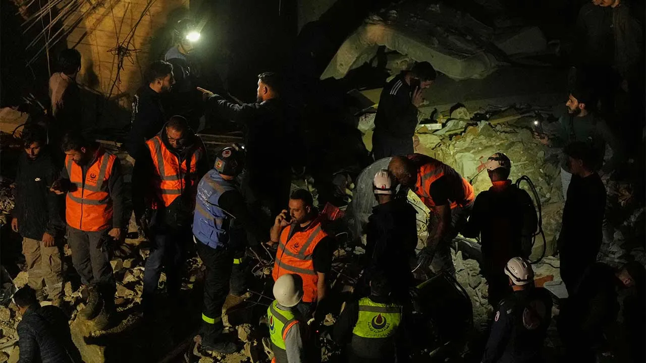 Rescue workers search through the rubble of a damaged building for survivors following an Israeli airstrike in Dahiyeh, Beirut's southern suburbs, Lebanon, Wednesday, May 6, 2026. (AP Photo/Hassan Ammar)