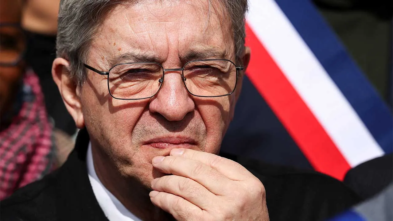 Jean-Luc Melenchon, leader of French far-left opposition party La France Insoumise (France Unbowed - LFI), listens to a speech during a rally against racism at the Mairie de Saint-Denis, called for by the newly elected mayor of Saint-Denis, Bally Bagayoko, in Saint Denis, Paris, April 4, 2026. REUTERS/Tom Nicholson