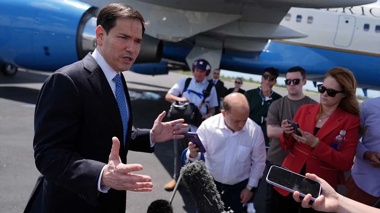 Secretary of State Marco Rubio speaks to the press before boarding his plane at Homestead Air Reserve Base, Thursday, May 21, 2026. Rubio is traveling to a NATO foreign ministers meeting in Sweden. Julia Demaree Nikhinson/Pool via REUTERS