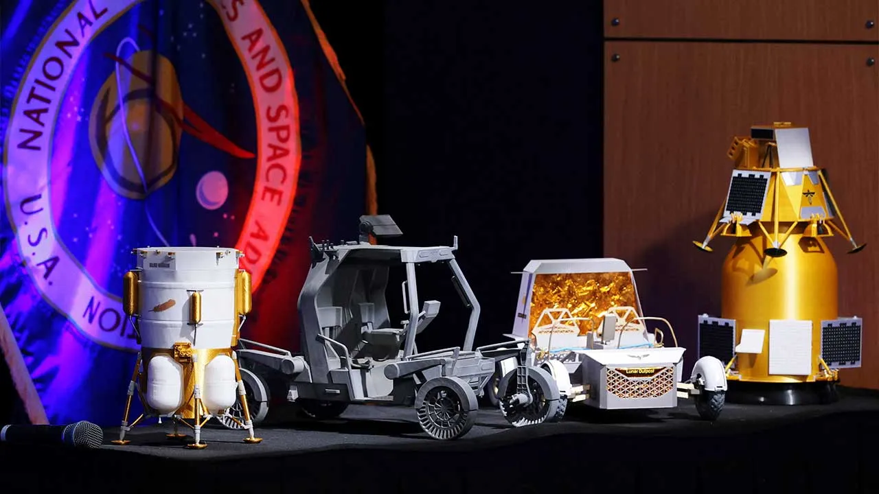 NASA displays newly unveiled lunar base project models from Blue Origin, Lunar Outpost and other companies during a news conference on updated plans for the agency’s Moon Base initiative for a long-term lunar presence, at NASA headquarters in Washington, D.C., U.S., May 26, 2026. REUTERS/Jonathan Ernst