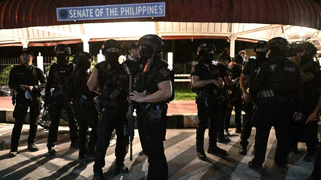 SWAT members stand outside the Philippine Senate, which holds Senator Ronald "Bato" dela Rosa, the chief enforcer of former President Rodrigo Duterte's drug war, in protective custody amid an International Criminal Court warrant, Pasay City, Metro Manila, Philippines, May 13, 2026. REUTERS/Noel Celis