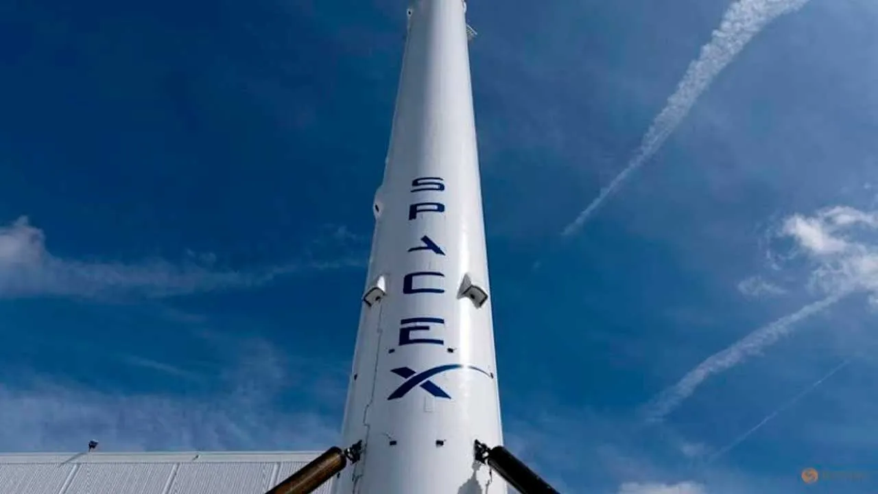 FILE PHOTO: The SpaceX Falcon 9 rocket booster is shown outside the company?s facility in Hawthorne California, U.S., April 23, 2026. REUTERS/Mike Blake/File Photo