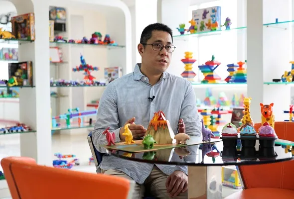 David Cheung, co-owner of Shaoguan Guanghua Plastic & Hardware Products Co., Ltd, speaks during an interview in the company?s showroom in Shaoguan, Guangdong province, China May 9, 2025. REUTERS/Go Nakamura/File Photo
