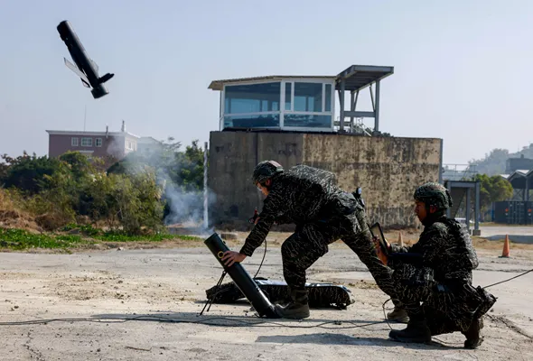 Soldiers operate a Taiwan-made attack drone during an annual military exercise ahead of the Lunar New Year, in Kaohsiung, Taiwan, January 29, 2026. REUTERS/Ann Wang/File Photo