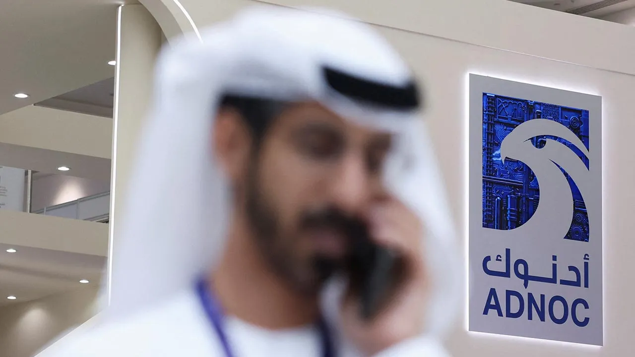 A logo of ADNOC is displayed at the Make it in the Emirates (MIITE) conference, in Abu Dhabi, United Arab Emirates, May 4, 2026. REUTERS/Amr Alfiky