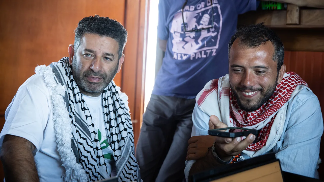 Saif Abukeshek, a Palestinian-Spanish activist and member of the Global Sumud Flotilla’s steering committee, left, and Thiago Ávila, a Brazilian activist and member of the Global Sumud Flotilla’s steering committee, aboard the Greenpeace vessel Arctic Sunrise, which joined a Gaza-bound flotilla in the Mediterranean Sea on April 18, 2026. (Max Cavallari/Greenpeace via AP)