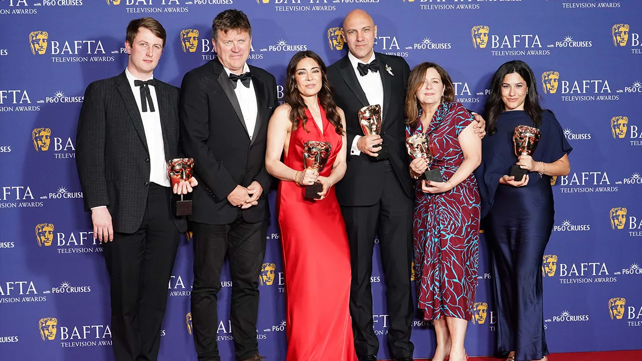 Ben De Pear, Ramita Navai, Karim Shah, Melanie Quigley and Menna Hijazi, winners of the Current Affairs Award for Gaza: Doctors Under Attack, at the BAFTA TV Awards 2026, at the Royal Festival Hall in London, Sunday May 10, 2026. (Ian West/PA via AP)