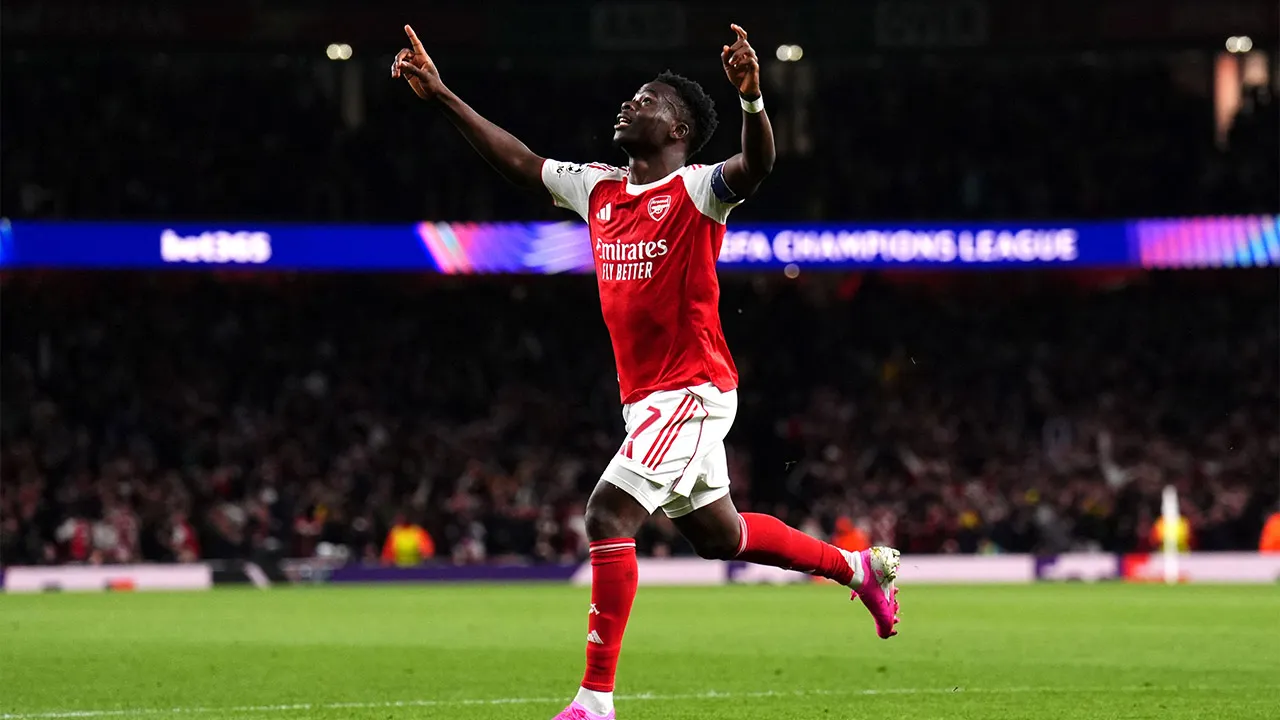 Arsenal's Bukayo Saka celebrates after scoring the opening goal during a Champions League semifinal, second leg, soccer match between Arsenal FC and Atletico Madrid in London, Tuesday, May 5, 2026. (John Walton/PA via AP)