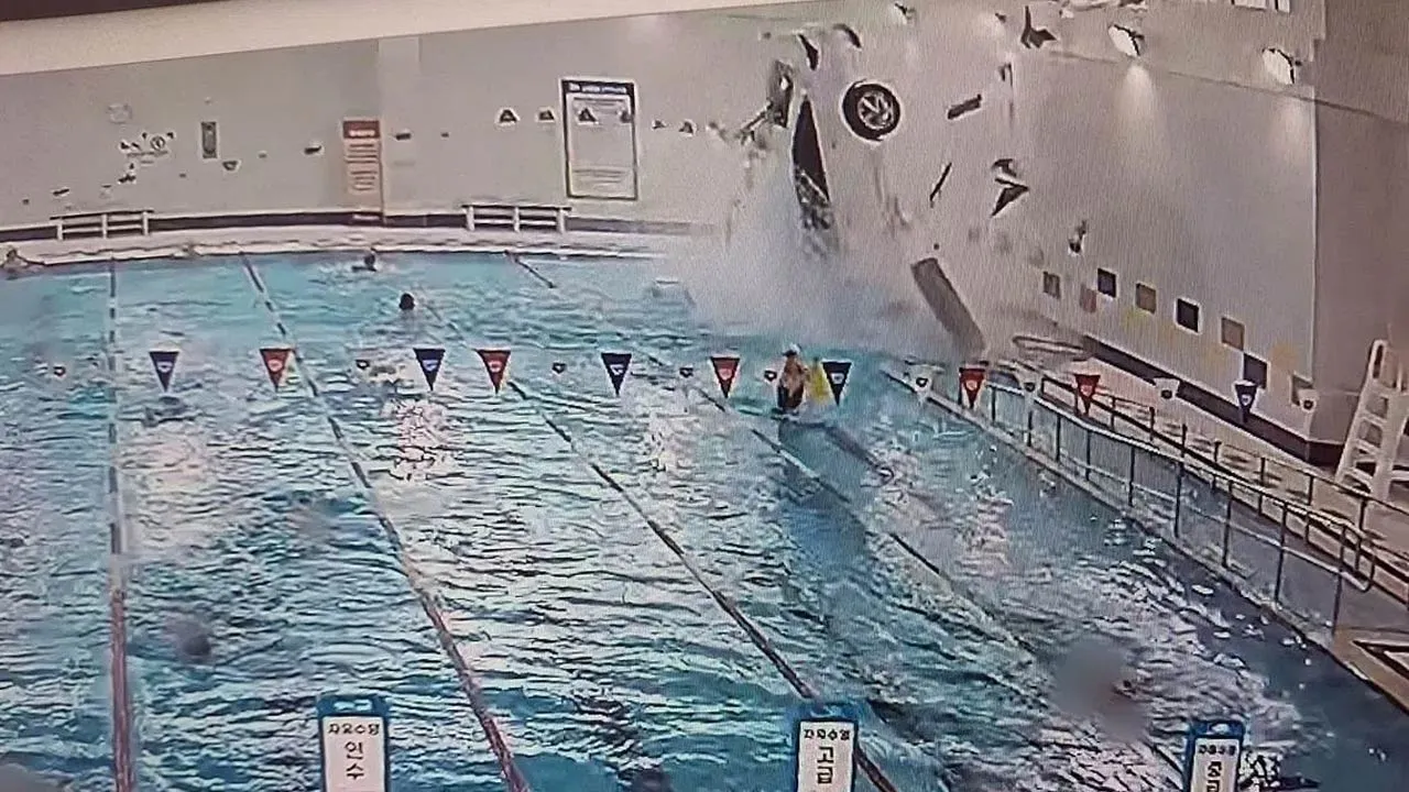 Car crashes pool