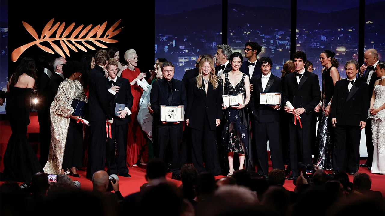 Director Cristian Mungiu, Palme d'Or award winner for the film "Fjord", Emmanuel Macchia and Valentin Campagne, co-winners of the Best Actor award winner for their roles in the film "Coward", director Pawel Pawlikowski, _REUTERS/Sarah Meyssonnier