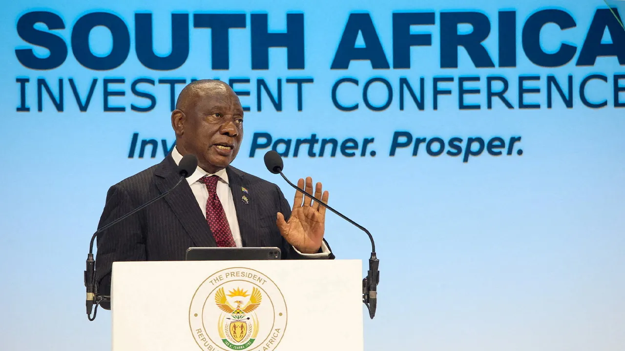 FILE PHOTO: South African President Cyril Ramaphosa gestures while delivering the keynote address at the Sixth South Africa Investment Conference (SAIC) at the Sandton Convention Centre in Johannesburg, South Africa. March 31, 2026. Jairus Mmutle/GCIS/Handout via REUTERS THIS IMAGE HAS BEEN SUPPLIED BY A THIRD PARTY/File Photo