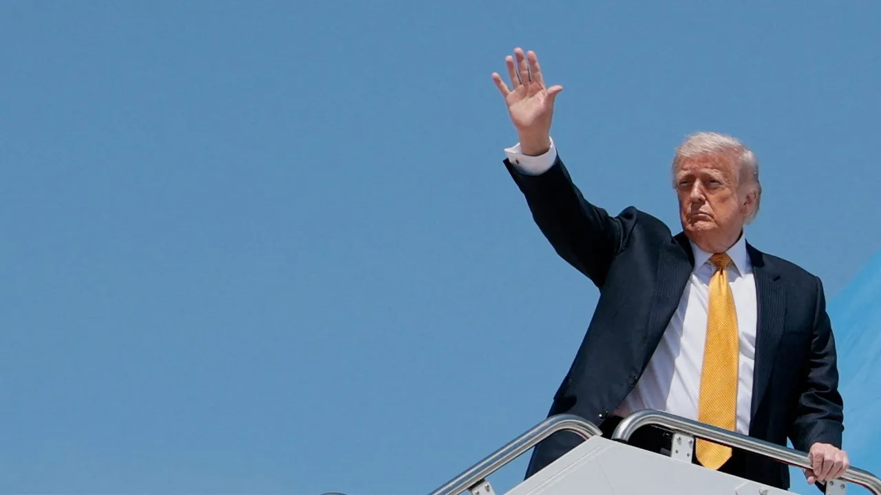 U.S. President Donald Trump waves as he boards Air Force One for a trip to China, at Joint Base Andrews, Maryland, U.S., May 12, 2026. REUTERS/Evan Vucci