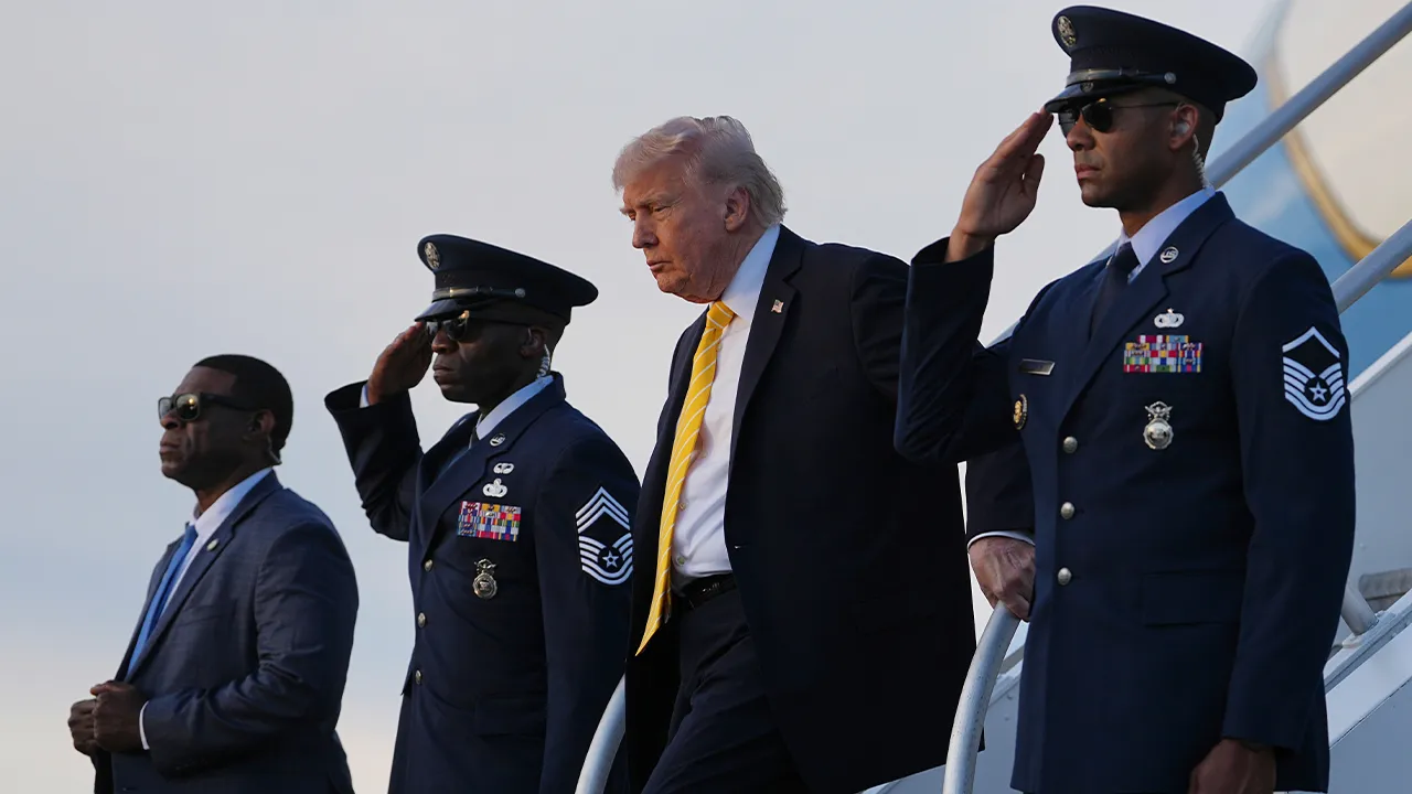 President Donald Trump arrives on Air Force One at Miami International Airport, in Miami, Saturday May 2, 2026. (AP Photo/Matt Rourke)