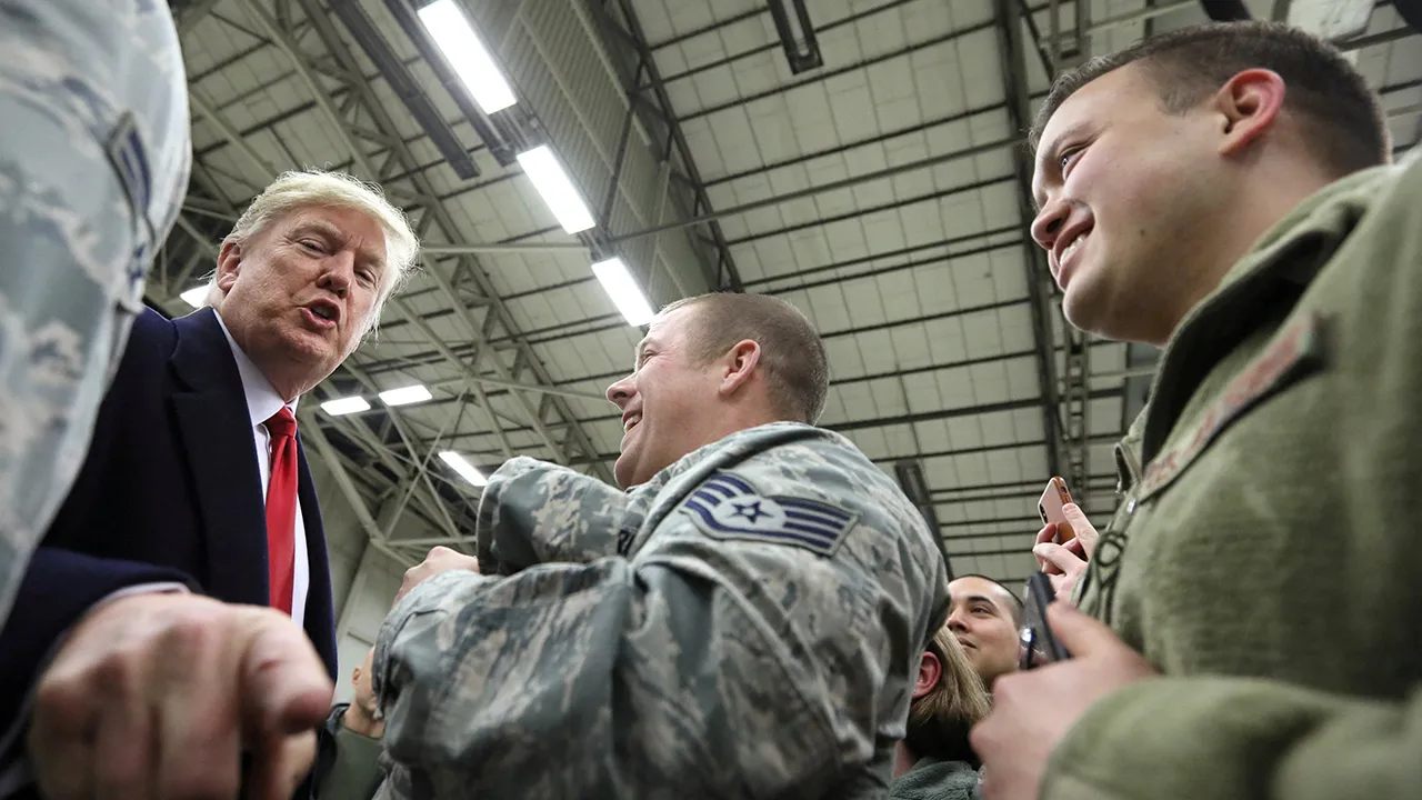 U.S. President Donald Trump gestures as he visits U.S. troops at Ramstein Air Force Base, Germany, December 27, 2018. REUTERS/Jonathan Ernst/File Photo