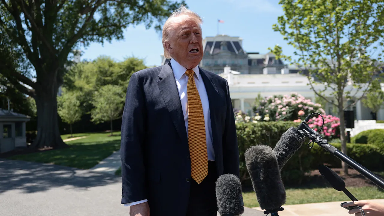 U.S. President Donald Trump speaks to the press, ahead of departing the White House for Joint Base Andrews en route to Beijing, China, in Washington, D.C., U.S., May 12, 2026. REUTERS/Evelyn Hockstein