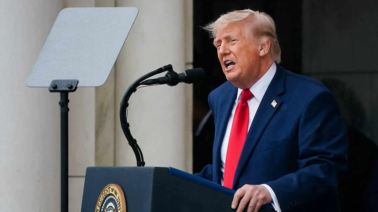 U.S. President Donald Trump delivers remarks in the Memorial Amphitheater during a Memorial Day event at Arlington National Cemetery, Arlington, Virginia, U.S., May 25, 2026. REUTERS/Nathan Howard