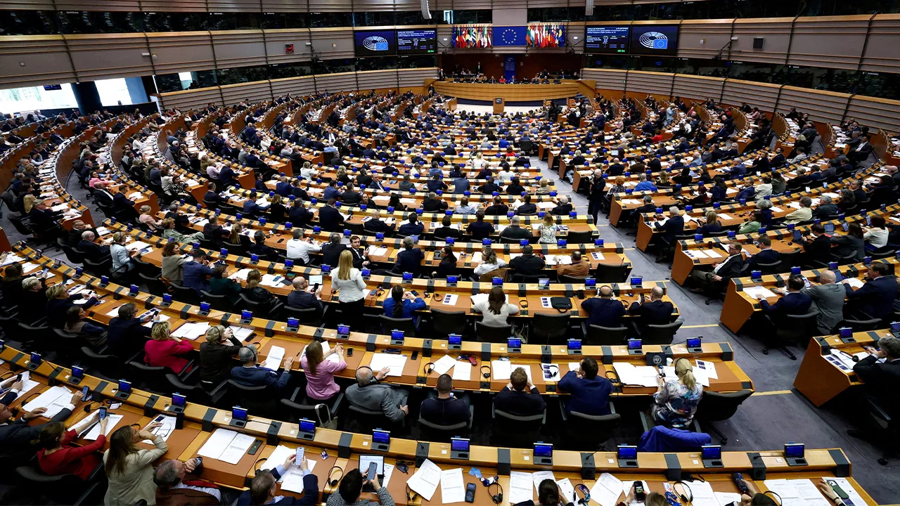 FILE PHOTO: FILE PHOTO: Members of the European Parliament attend a session to vote on legislation to cut import duties for U.S. products, in Brussels, Belgium March 26, 2026. REUTERS/Yves Herman/File Photo/File Photo