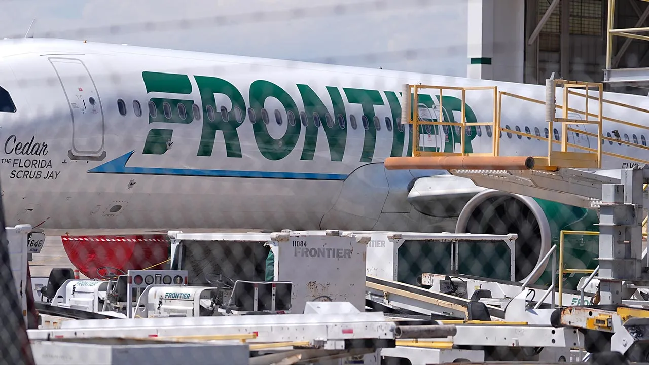 Frontier Airlines jetliner number n646fr sits outside the airlines technical operations center with other jetliners in for service north of Denver International Airport Saturday, May 9, 2026, in Denver. (AP Photo/David Zalubowski)