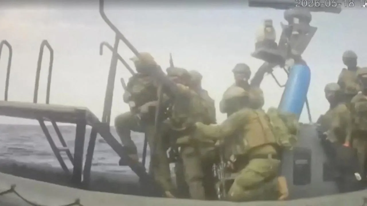 An Israeli naval boat intercepts the Global Sumud Flotilla en route to Gaza, in an attempt to deliver aid, at sea May 18, 2026, in this screengrab taken from a handout video. Global Sumud Flotilla/Handout via REUTERS 