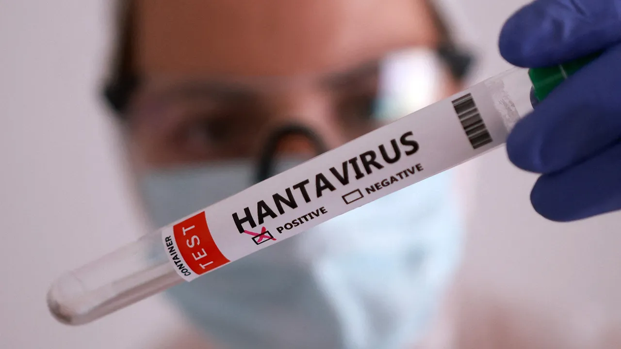 A test tube labelled "Hantavirus positive" is held in this illustration taken May 7, 2026. REUTERS/Dado Ruvic/Illustration