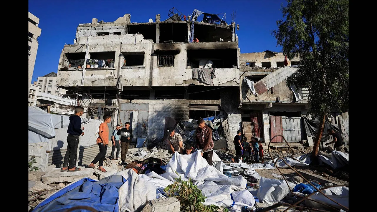 Palestinians inspect the damage at the site of an Israeli strike on Wednesday in Gaza City, May 28, 2026. REUTERS/Dawoud Abu Alkas