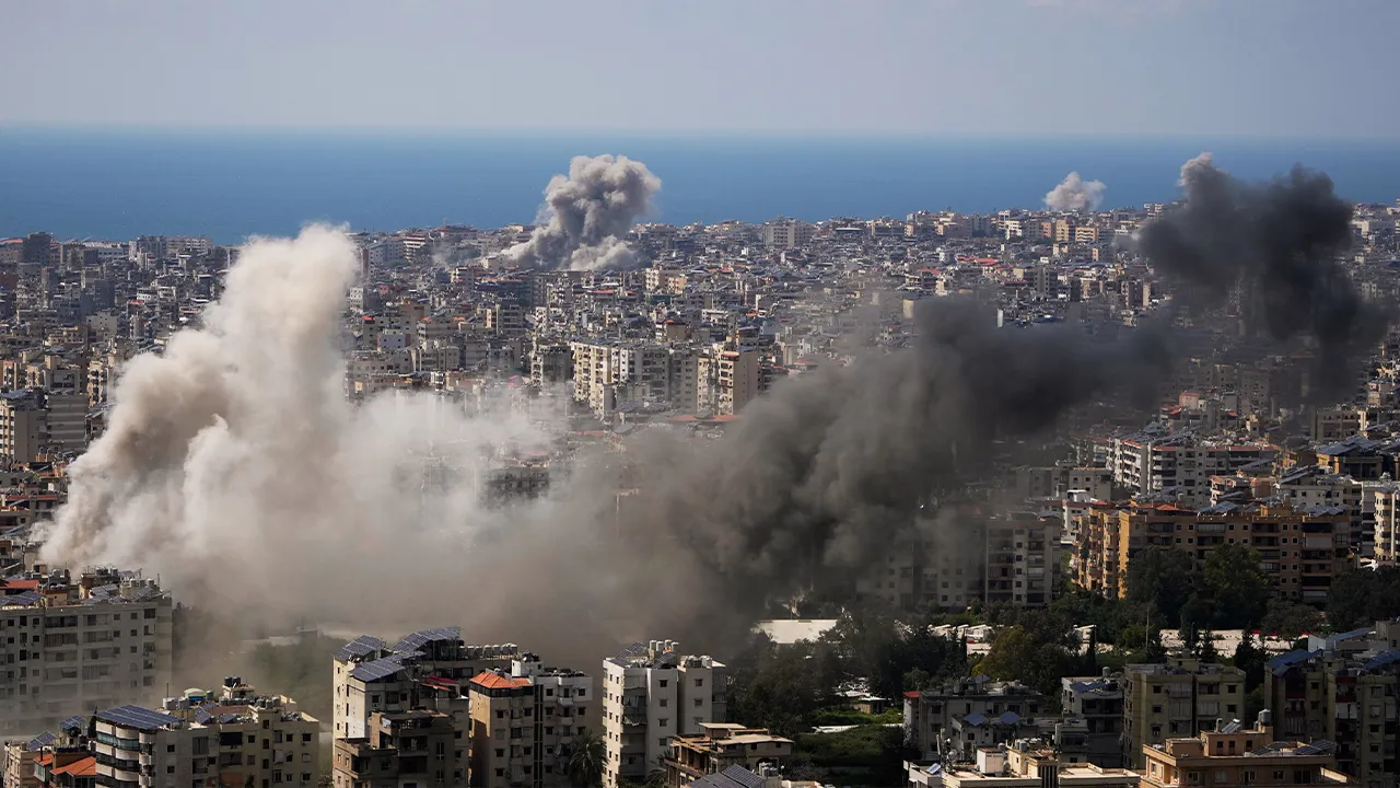 FILE - Smoke rises following several Israeli airstrikes that hit without previous warning Beirut's southern suburbs and central Beirut, Lebanon, Wednesday, April 8, 2026. (AP Photo/Hassan Ammar, File)