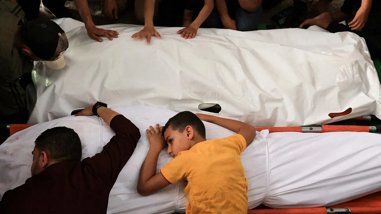 Relatives mourn during the funeral of Palestinians killed in an Israeli strike, according to medics, in Gaza City, May 17, 2026. REUTERS/Dawoud Abu Alkas 