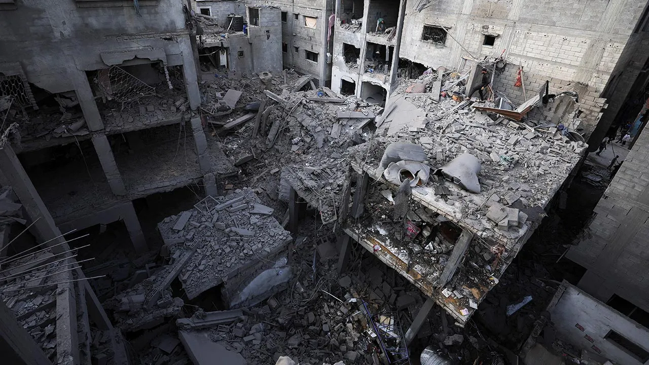 Debris lies at the site of a Friday Israeli air strike on houses at Shati (Beach) refugee camp in Gaza City, May 9, 2026. REUTERS/Dawoud Abu Alkas