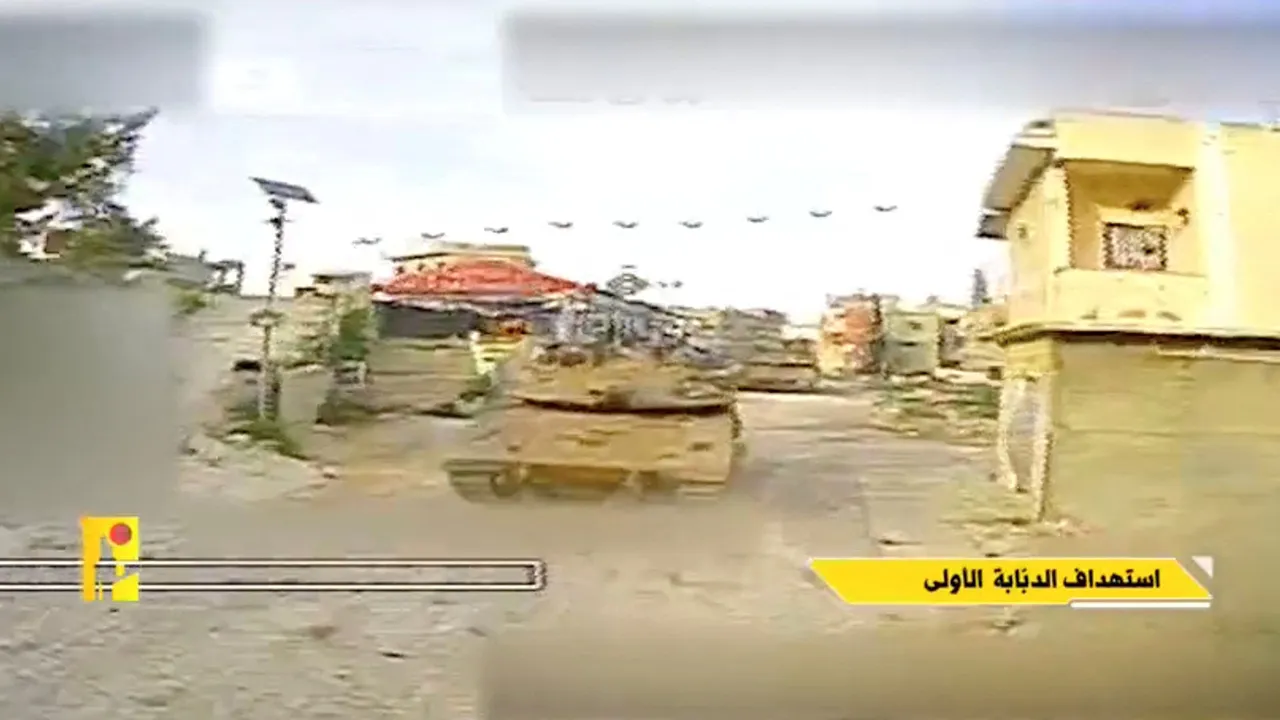 A screengrab taken from a video released by Hezbollah says to show an Israeli tank moments before being hit by an FPV drone attack, in Meiss Al-Jebel, Lebanon, with the date of the video given as April 15, 2026. HEZBOLLAH MILITARY MEDIA/Handout via REUTERS THIS IMAGE HAS BEEN SUPPLIED BY A THIRD PARTY. OVERLAY FROM SOURCE. BLURRING FROM SOURCE. BEST QUALITY AVAILABLE. VERIFICATION: - Water body, buildings, and road layout in time codes 00:26-1:06 and 1:14-2:05 matched satellite imagery - Coordinates: 33.166