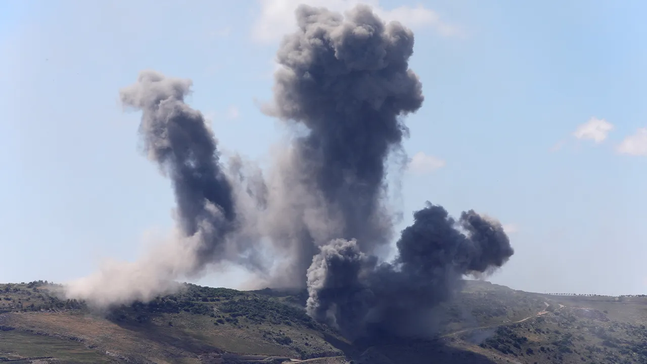 Plumes of smoke billow from southern Lebanon following Israeli strikes, as seen from Marjayoun, Lebanon May 24, 2026. REUTERS/Stringer