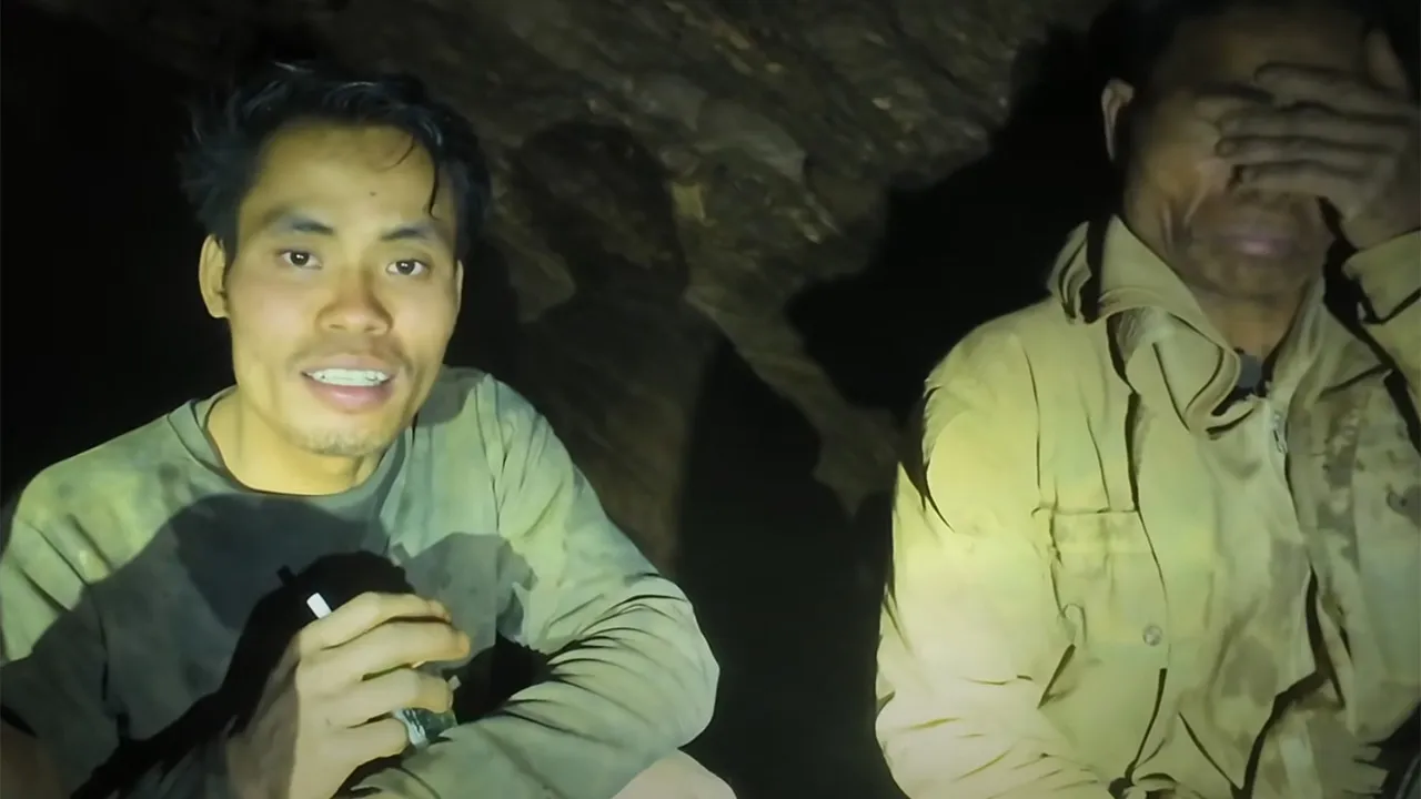 This image made from the video provided by Benz Norrased Palasing Seascout Diving shows the villagers who were trapped and found in a flooded cave in Xaisomboun province, Laos, Wednesday, May 27, 2026. (Benz Norrased Palasing Seascout Diving via AP)