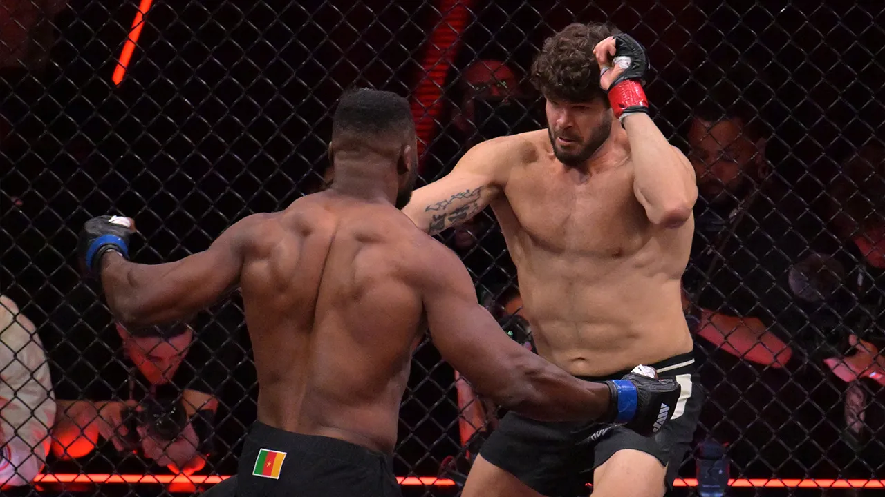 May 16, 2026; Los Angeles, California, USA; Francis Ngannou (blue gloves) fights Philipe Lins (red gloves) in a heavyweight bout at Intuit Dome. Mandatory Credit: Jayne Kamin-Oncea-Imagn Images