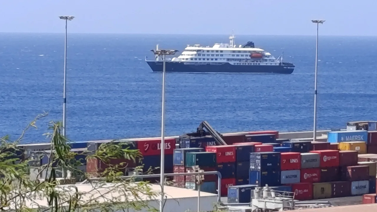 Cruise ship MV Hondius docks off Cape Verde port, as passengers were not allowed off the ship, while health authorities investigated suspected cases of hantavirus aboard the vessel, in Praia Port, Cape Verde, May 4, 2026. Picture taken with a mobile phone. REUTERS/Stringer