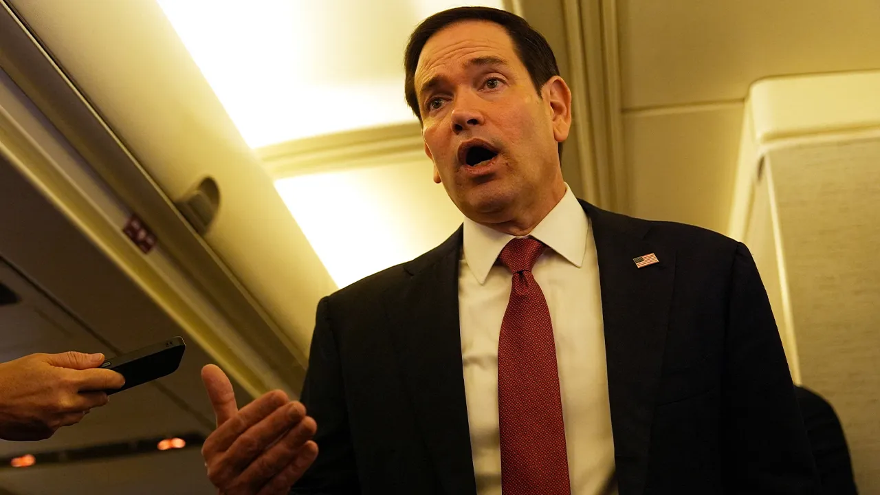 U.S. Secretary of State Marco Rubio speaks to reporters on board his plane at Jaipur International Airport in Jaipur, India, Tuesday, May 26, 2026. Julia Demaree Nikhinson/Pool via REUTERS