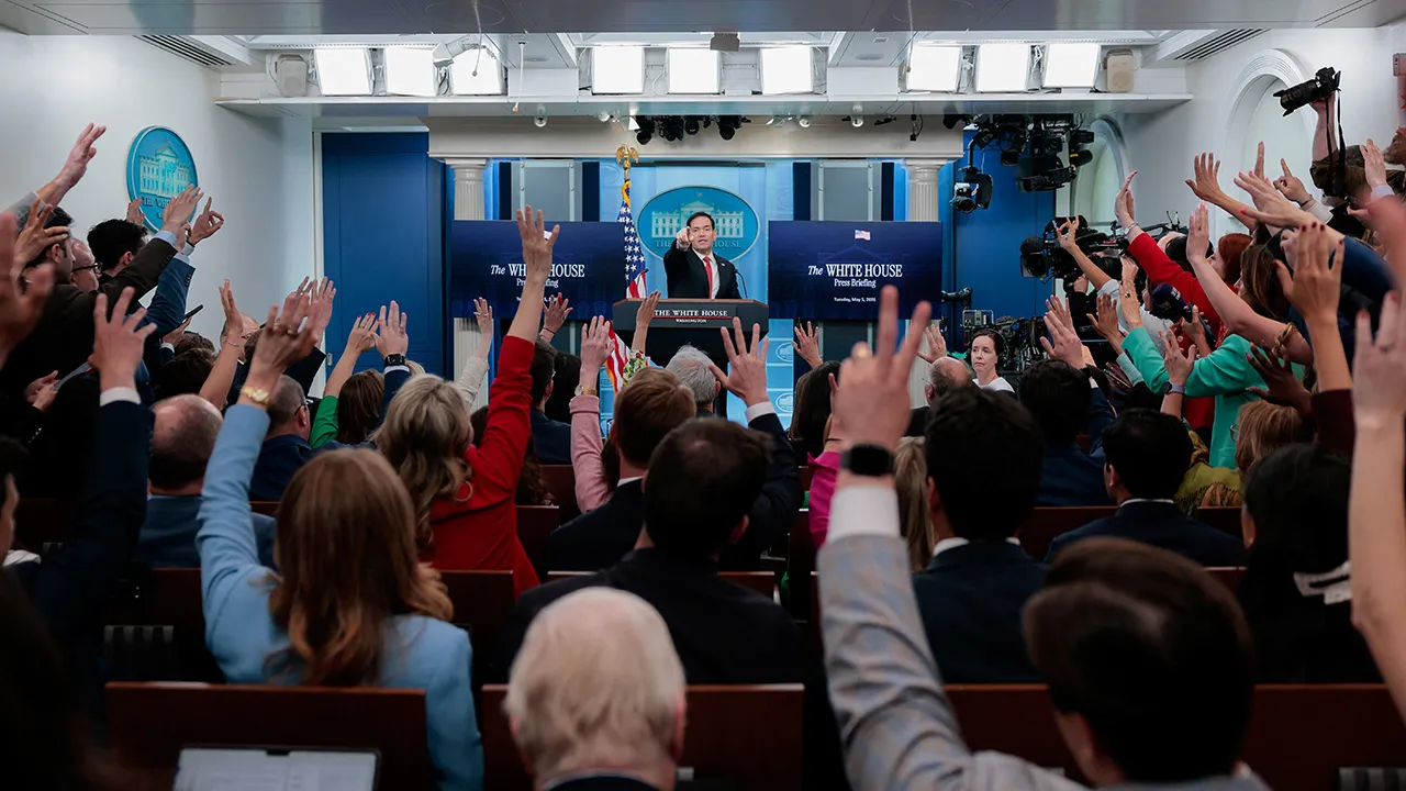 U.S. Secretary of State Marco Rubio points as members of the media raise their hands during a press briefing in the James S. Brady Press Briefing Room at the White House in Washington, D.C., U.S., May 5, 2026. REUTERS/Kylie Cooper