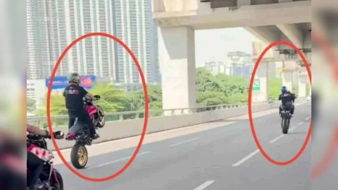 angkap layar tular rakaman memaparkan aksi wheelie oleh penunggang motosikal berkuasa tinggi di Lebuhraya SPE._SINAR HARIAN