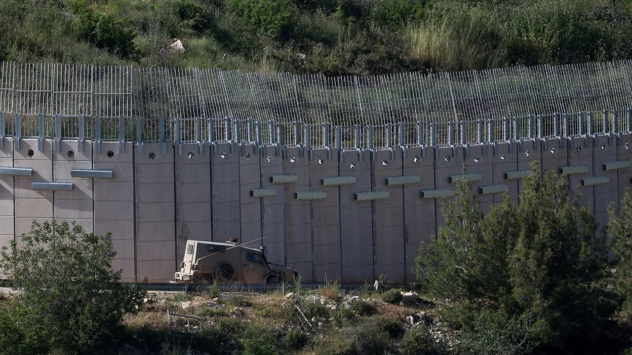 An Israeli military vehicle operates by the Israeli‑Lebanese border, in northern Israel, May 14, 2026. REUTERS/Shir Torem