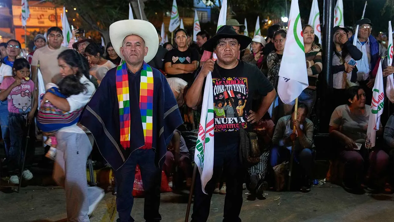 Supporters of presidential candidate Roberto Sanchez of Together for Peru party, attend his rally in Huaycan community in Lima, Peru, Saturday, May 9, 2026. (AP Photo/Martin Mejia)